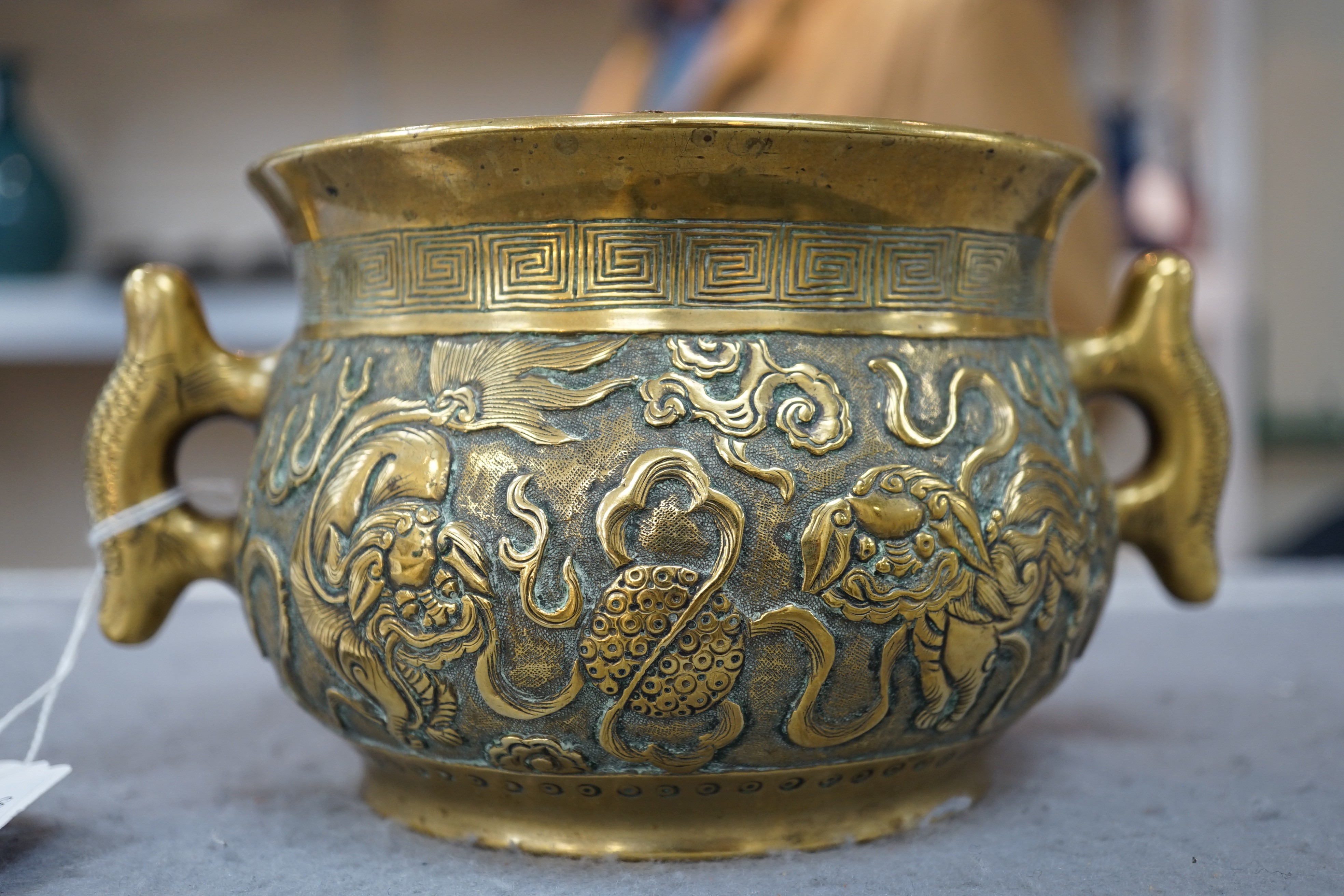 A Chinese polished bronze ‘Buddhist lion’ censer, gui, 19th century, 19.5cm wide, rim diameter 14cm
